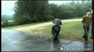 Jon Huntsman riding a motorcycle