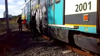 Footage of grafitti vandals tagging train in Manchester