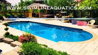 Another Beautiful  Custom Backyard Design With a Fiberglass Pool & Stone Work .