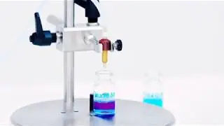 Flexicon PF7 tabletop peristaltic liquid filling machine