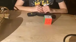 Cubing, But every time I solve, I have to play trumpet…