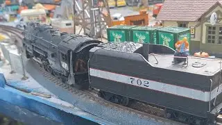 2-8-4 Steam Engine hauling Halloween float cars...