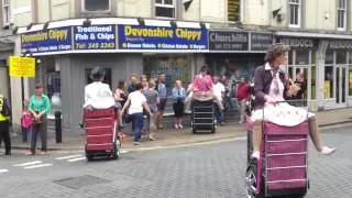 Granny Turismo: Formation dancing grannies on shopping trolleys at Tramlines