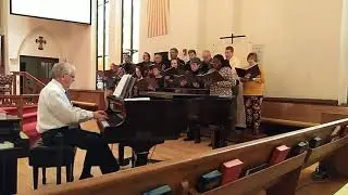 The Chancel Choir singing, 
