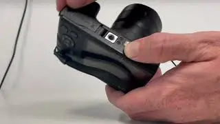 How to change battery in Canon SX400IS