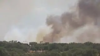 Smoke Rider Fire burns nearly 1,000 acres on Blanco and Hays County line | FOX 7 Austin