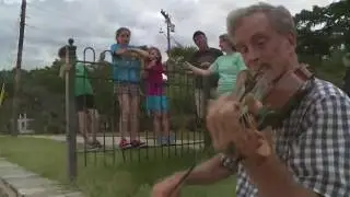 Down the Street : Meet the fiddler on the lake