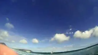 I fall while Fabrice Beaux rides his wave