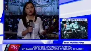 Devotees wait for arrival of Black Nazarene at Quiapo Church