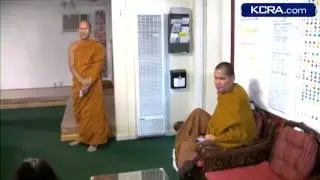 Burglars break into temple as monk watches security video