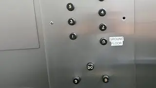 Original 1960&rsquo;s Otis relay-controlled elevator with rare small black buttons in Melbourne, Australia