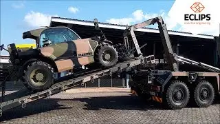Telehandler loading onto HX77 truck