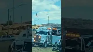 💥 Semi truck accident with heavy  load tow trucks in position for towing the crashed semi trailers