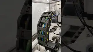 USB over some extra twisted ethernet. it's gotta run along the 220v AC servo cables. Bad idea?