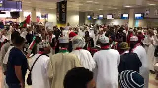 Oman fans have a bagpipe party at Muscat airport en route to Gulf Cup
