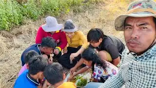 Having a wonderful time eating papaya salad by the rice fields