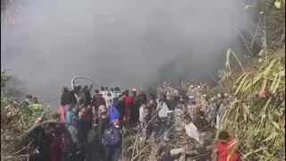 68 people confirmed dead after passenger plane crashes in Nepal, officials say