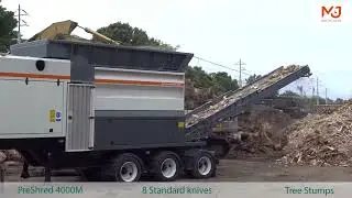 Shredding tree stumps – wood waste – M&J 4000S pre-shredder