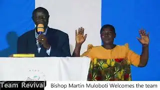 Team revival at Evangelism Outreach & Annointing Ministry. Bsp Martin invites the congregation.