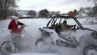 Santa pulled behind 1000cc Polaris RZR - Godfrey Clan