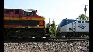 Canadian Pacific Train 734 with KCS ES44AC 4800 meets Amtrak train 49 Chesterton IN June 2025