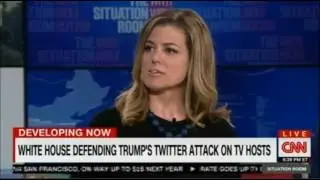 Wolf Blizter light moment when a CNN guest on his show appears to call another CNN guest a fraud