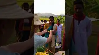 AI video of me giving out bananas to a line of people.