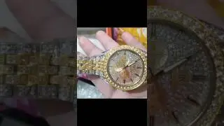 Elegant Gold Luxury Watch with Diamond Accent