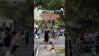 Foreign tourists join aerobics class at Bangkok's Lumpini Park #AerobicsDancing #LumpiniPark