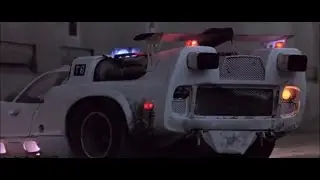 Stolen squad car chased in year 2112