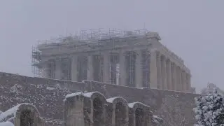 Heavy snowfall has blanketed central Athens