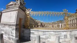 Versailles golden front gates entrance. Palace of Versailles, France.