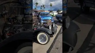 Ford model a pickup truck hot rod leaving classic car show