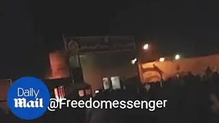 Protestors attack Iranian police station during violent clashes - Daily Mail