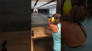 A girl and her gun