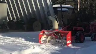 Kubota BX24 paired with a Farm King 660 (66 inch) Snow Blower