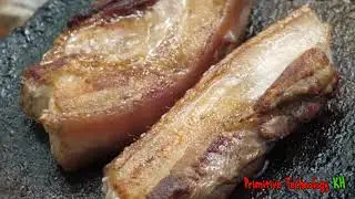 Primitive Technology - Eating delicious - Smart cooking pork belly on a rock - I Share