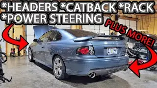 Installing Exhaust, Headers, Steering Rack, DS Bearing, PS Relocation, Spark Plugs on the 2006 GTO