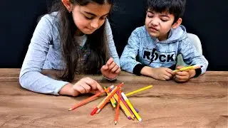Kalemleri toplama oyunu. Kıpırdatan kaybeder