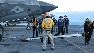 Inside the Action: US Marines and Sailors Conduct Flight Deck Ops on USS Boxer