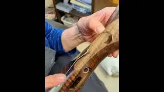#WoodWorkWednesday | Karen is showing us how the checkering is done around a Fleur-de-lis pattern.