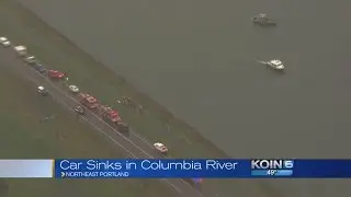 Car pulled from Columbia River, body still in water