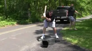 Mailbox meets baseball bat