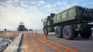 U.S. Marine M142 HIMARS Loads On Army Landing Craft