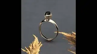 Only You black - Black diamond embedded in a lacy golden basket. A unique engagement ring that de...
