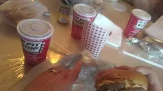 Eating a Cheeseburger and fries from The Pit Stop Restaurant - Merrick, NY