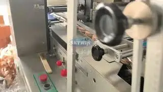 Sandwich biscuit machine