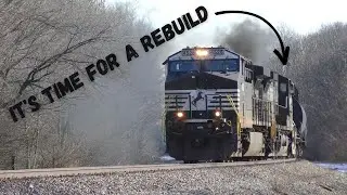An old Dash-9 smokes up as the engineer revs up the locomotives after doing yard work