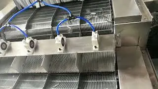 How does the metal stamping parts pass-through ultrasonic cleaning machine remove oil pollution?
