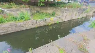 Walking the south yorkshire navigation canal into rotherham town england 